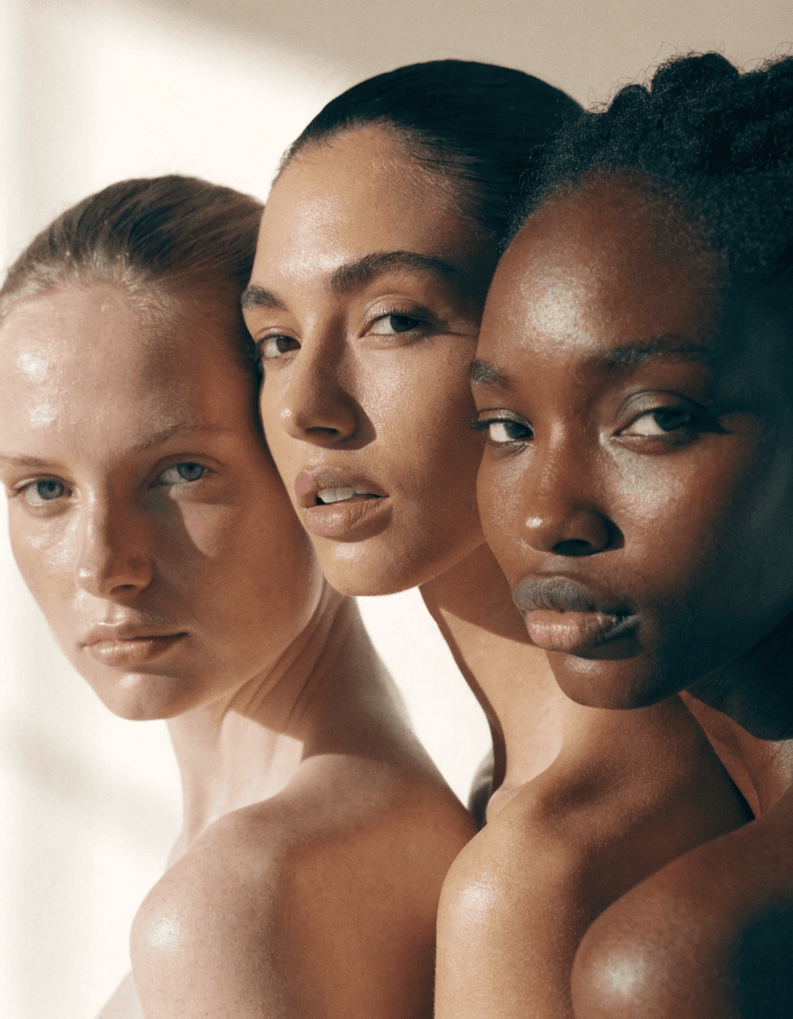 Three people with fair, medium and deep skin tones